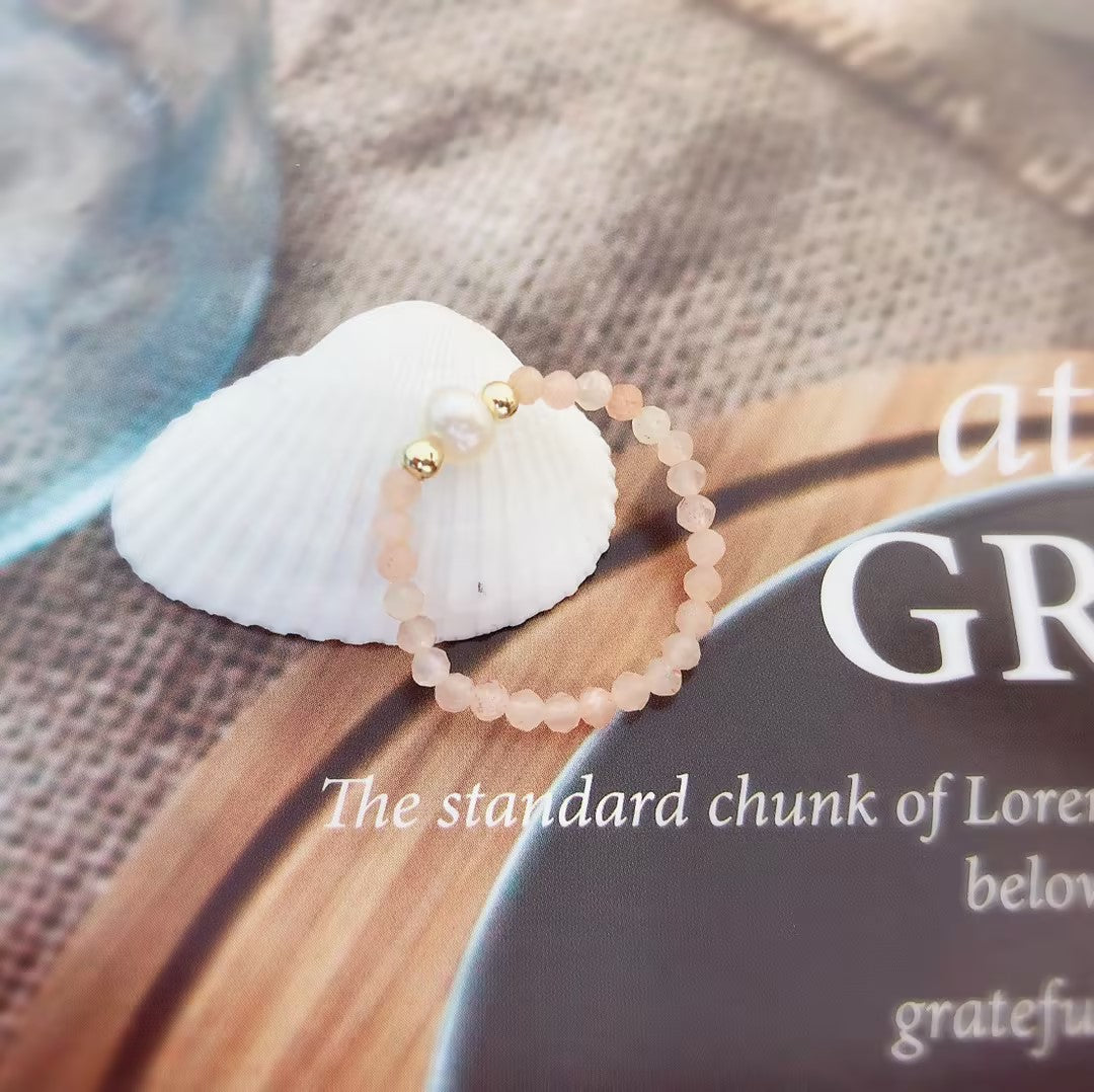 Orange moonstone bungee string pearl ring