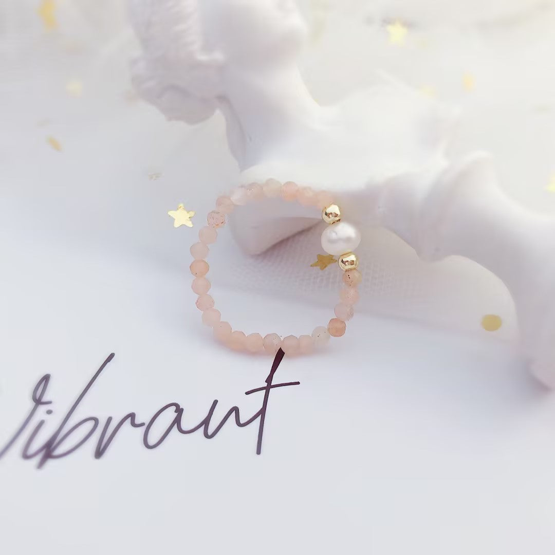 Orange moonstone bungee string pearl ring